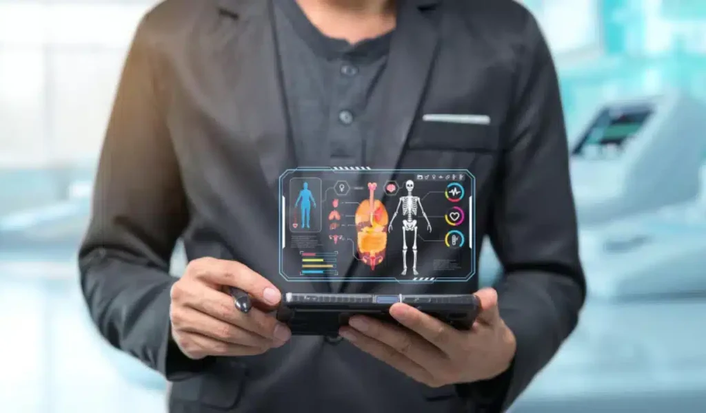 A man in a suit holds a tablet displaying a digital human body image, representing patient onboarding automation.